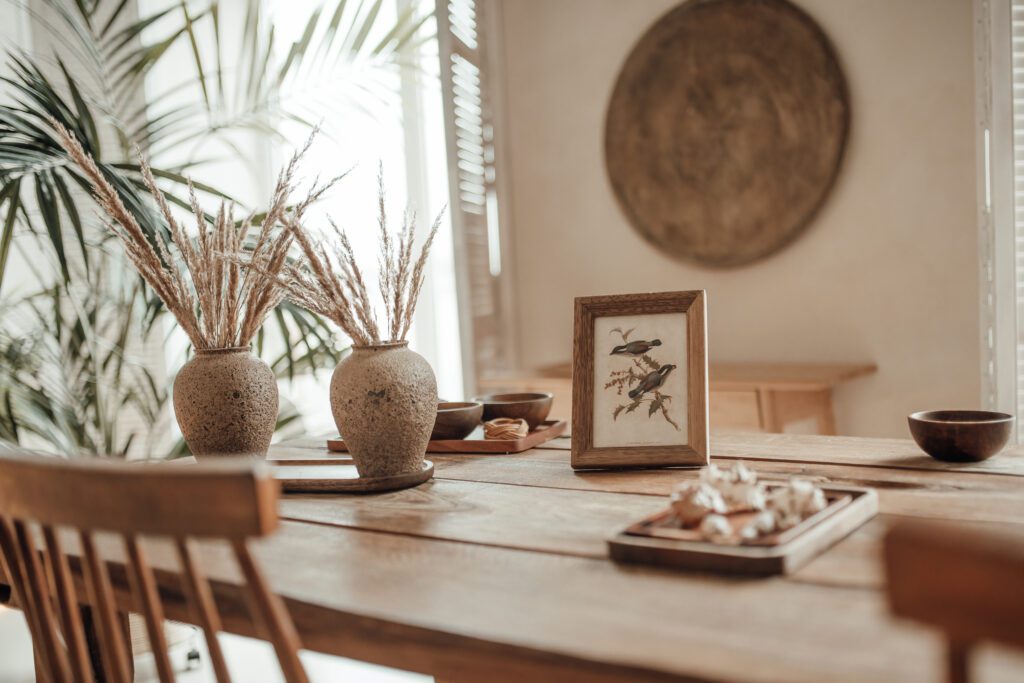 Soft native hues organic shapes look of living room to wood accents in neutrals tones. Green palm plants beige walls and niches different sizes minimalist open space luxury interior ethnic design